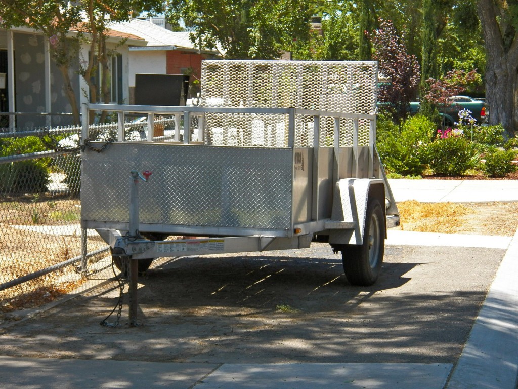 You can easily tow the bike yourself using an open air trailer like the one pictured here.